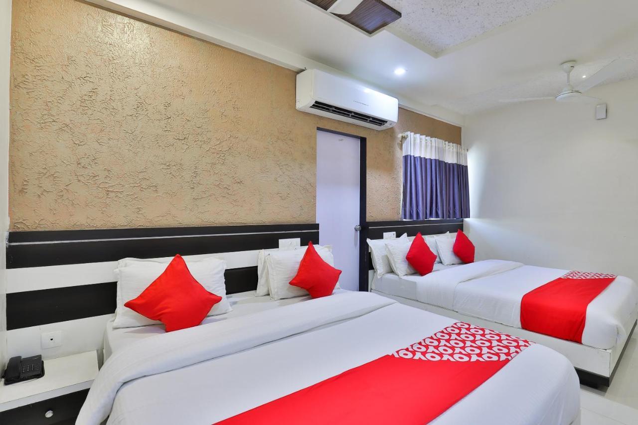 Oyo 18807 Vrajbhoomi Hotel Somnath Bagian luar foto